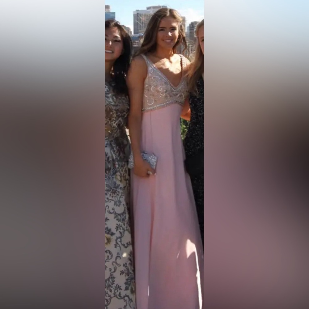 Selling Pronovias Long Pink Beaded Dress with Open Back.